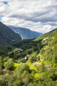 Scenic view of landscape and mountains against sky