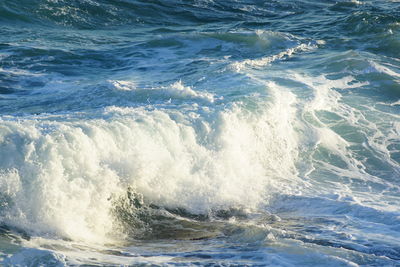 Waves splashing on shore