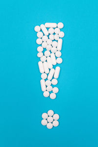 High angle view of blue paint on white background