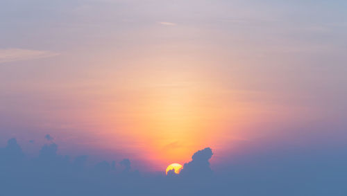 Silhouette people standing against sky during sunset