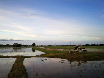 Scenic view of lake against sky