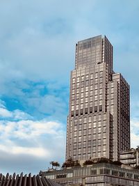 Low angle view of skyscrapers against sky