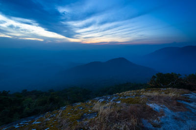 Scenic view of mountains against sky during sunset