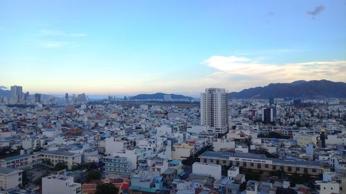 High angle view of buildings against sky in city