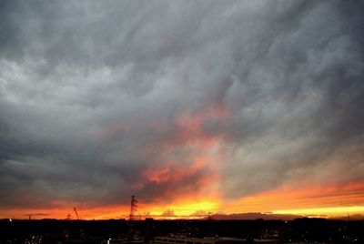 Scenic view of dramatic sky during sunset