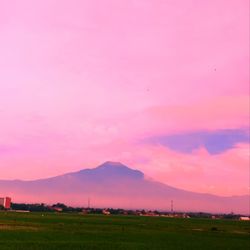 Scenic view of landscape against sky during sunset
