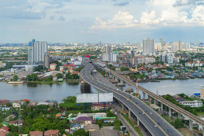 High angle view of river amidst buildings in city