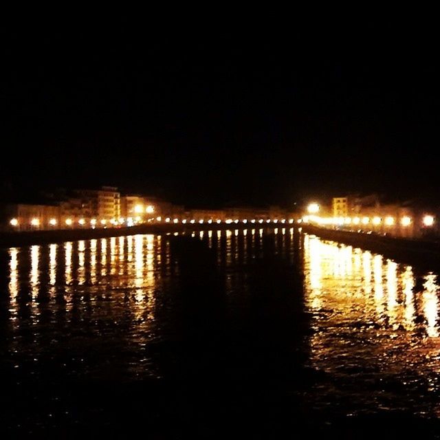 water, reflection, illuminated, night, architecture, built structure, waterfront, river, building exterior, clear sky, city, bridge - man made structure, connection, copy space, outdoors, no people, silhouette, dark, lake, sky