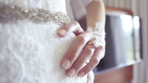 Close-up of woman hand holding hands