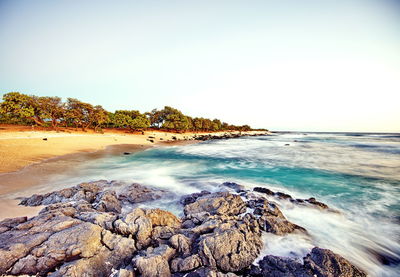 Scenic view of sea against clear sky