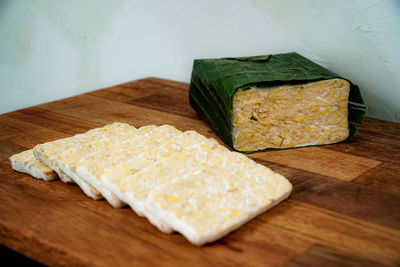 High angle view of bread on cutting board