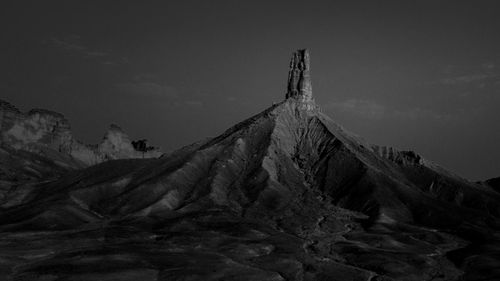 Scenic view of rock formation against sky