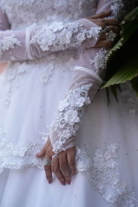 Midsection of woman washing hands