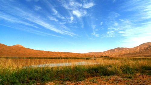 View of a lake with mountain range in the background