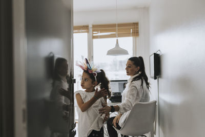 Mother and daughter at home