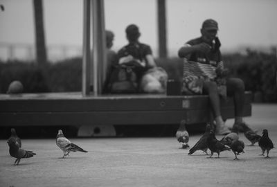 Group of people sitting outdoors