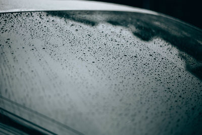 Close-up of wet glass window