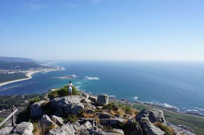 Scenic view of calm sea against clear sky