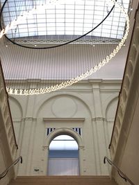 Low angle view of glass ceiling
