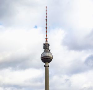 Low angle view of fernsehturm tower against sky