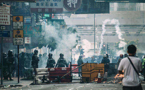 People standing on street in city