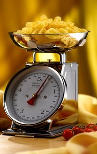 Close-up of clock on table