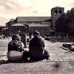 People looking at building