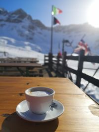 Coffee cup on table in restaurant