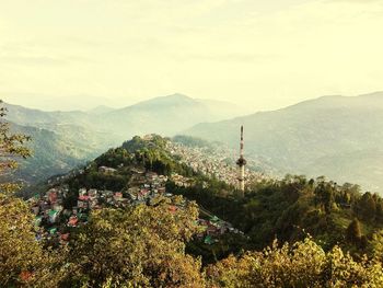 High angle view of plants and mountains against sky