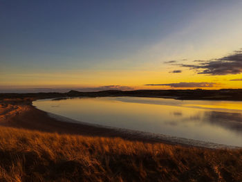 Scenic view of sunset over sea