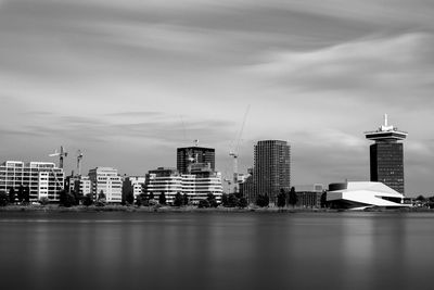 Modern buildings in city against sky amsterda skyline long exposure eye museum