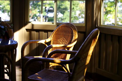 Empty chairs against the windows