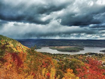 Scenic view of sea against cloudy sky
