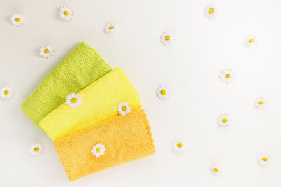 High angle view of personal accessories over white background