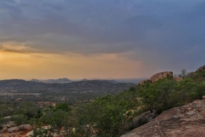 Scenic view of landscape against sky during sunset
