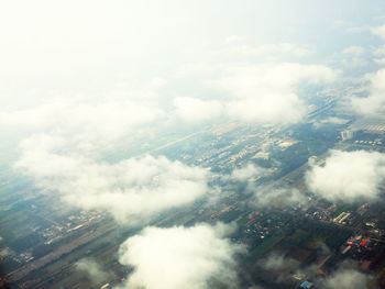 High angle view of buildings in city against sky