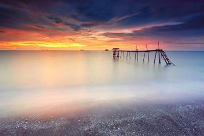 View of calm sea at sunset