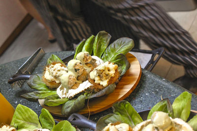 Close-up of food served in plates on table