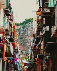 Panoramic view of market and buildings in city