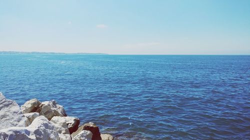 Scenic view of sea against clear sky