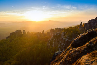 Scenic view of mountains against sky during sunset