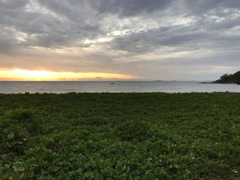 Scenic view of sea against dramatic sky