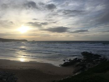 Scenic view of sea against sky during sunset