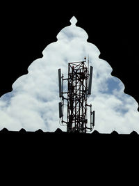 Low angle view of silhouette structure against sky