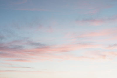 Low angle view of cloudy sky during sunset