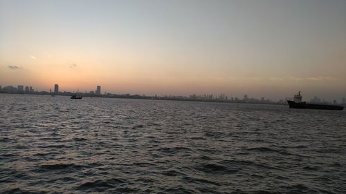 Scenic view of sea against sky during sunset