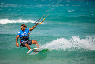 Man surfing in sea