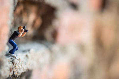 Close-up of person holding rock