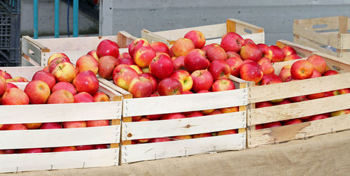Various fruits in crate at market stall