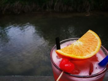 High angle view of orange slice in container